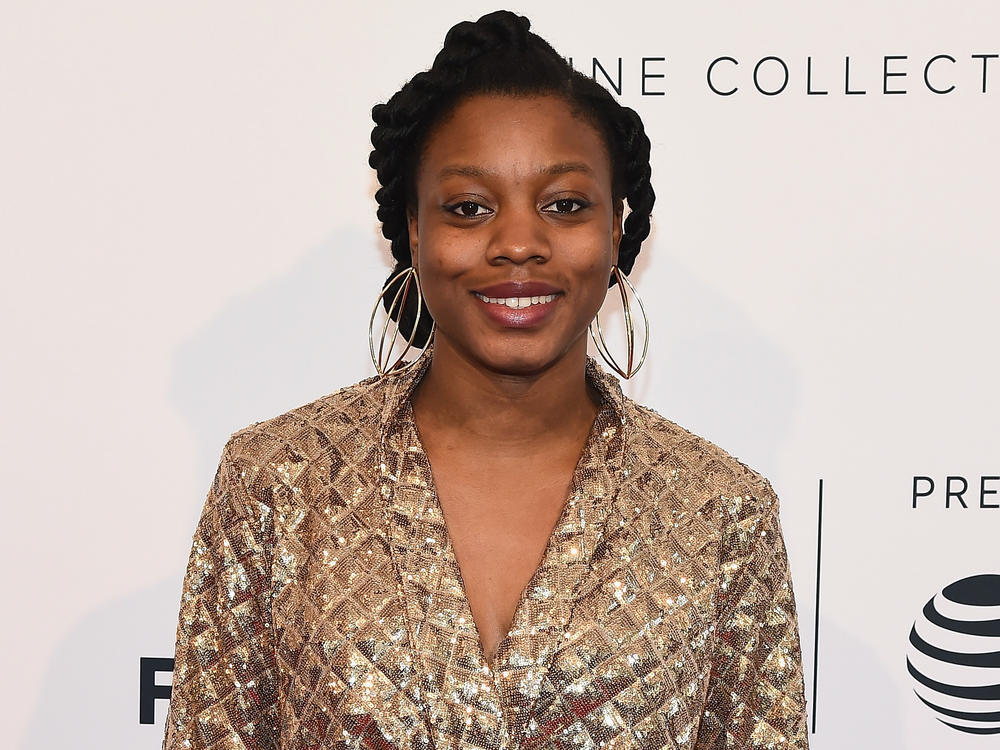 Director and screenwriter Nia DaCosta (shown here in 2018) has made history with the debut of her horror film <em>Candyman.</em>