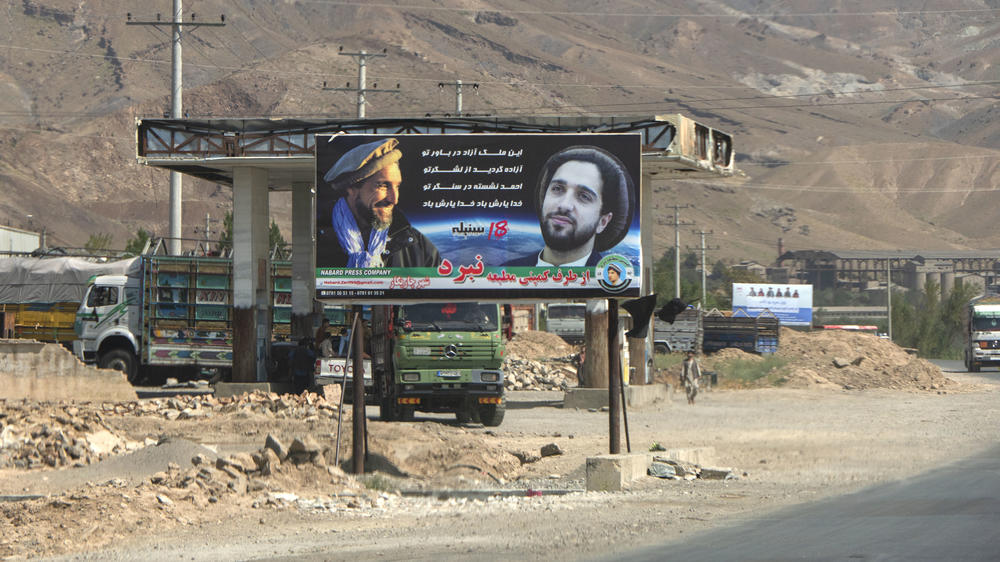 A banner in the Panjshir Valley portrays of Ahmad Massoud and his father with a slogan 