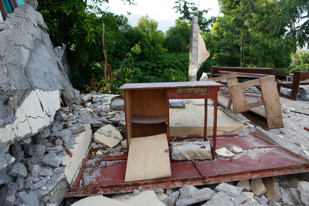 Desks, chairs and school supplies are seen throughout the Mission Evangélique Baptiste du Sud d'Haiti Picot, which was destroyed in the 7.2 magnitude earthquake.