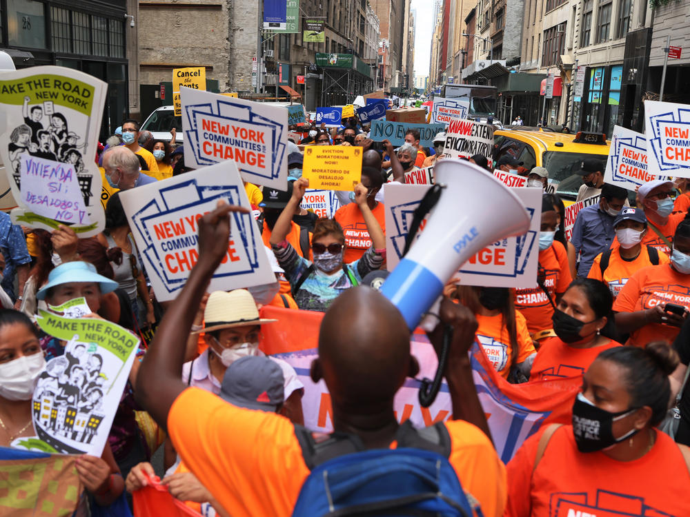 Housing activists and community members march toward the New York City office of Gov. Kathy Hochul calling for a stop to evictions on Tuesday in New York City. The state extended its eviction moratorium on Wednesday.