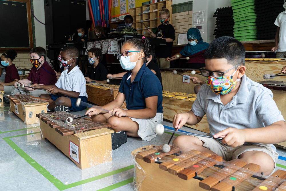 Students in Quesada's third grade music class all get the opportunity to play a xylophone. Quesada does what she can to keep the instruments clean. Her xylophones are expensive and wiping them down regularly could ruin them, so instead she spends her morning wrapping them in plastic wrap.