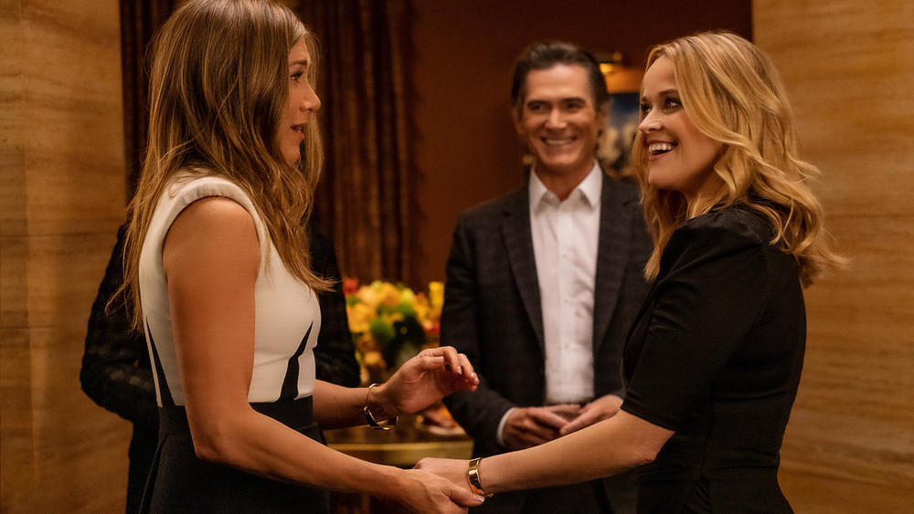 Alex (Jennifer Aniston) and Bradley (Reese Witherspoon) have a reunion that is about as tense as it looks in this picture.