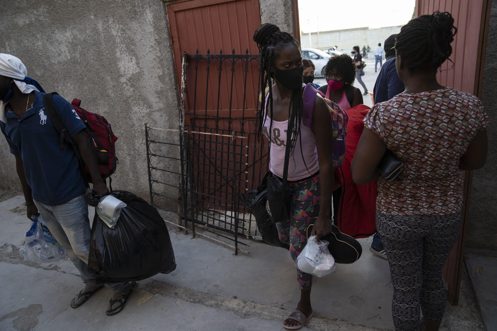 Migrants arrive at a shelter in Ciudad Acuña, Mexico.