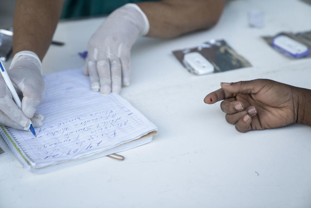 A migrant gets tested for Syphilis and HIV at a shelter in Ciudad Acuña, Mexico.