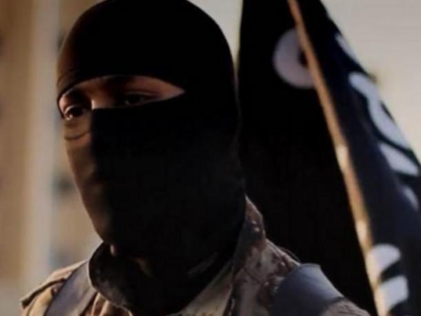 A photo provided by the FBI depicts a masked militant from an ISIS propaganda video from 2014. The individual pictured has allegedly been identified as Mohammed Khalifa.