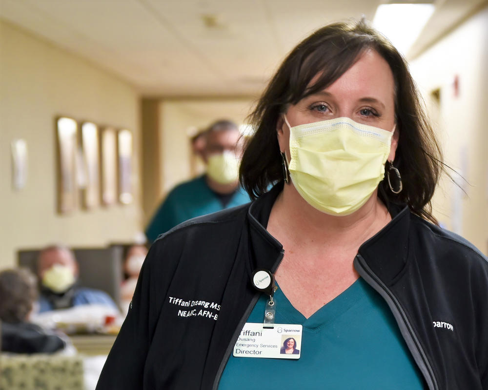 Tiffani Dusang is the director of emergency and forensic nursing at Sparrow Hospital. As overworked nurses leave, she struggles to staff every shift and works hard to keep remaining nurses from burning out.
