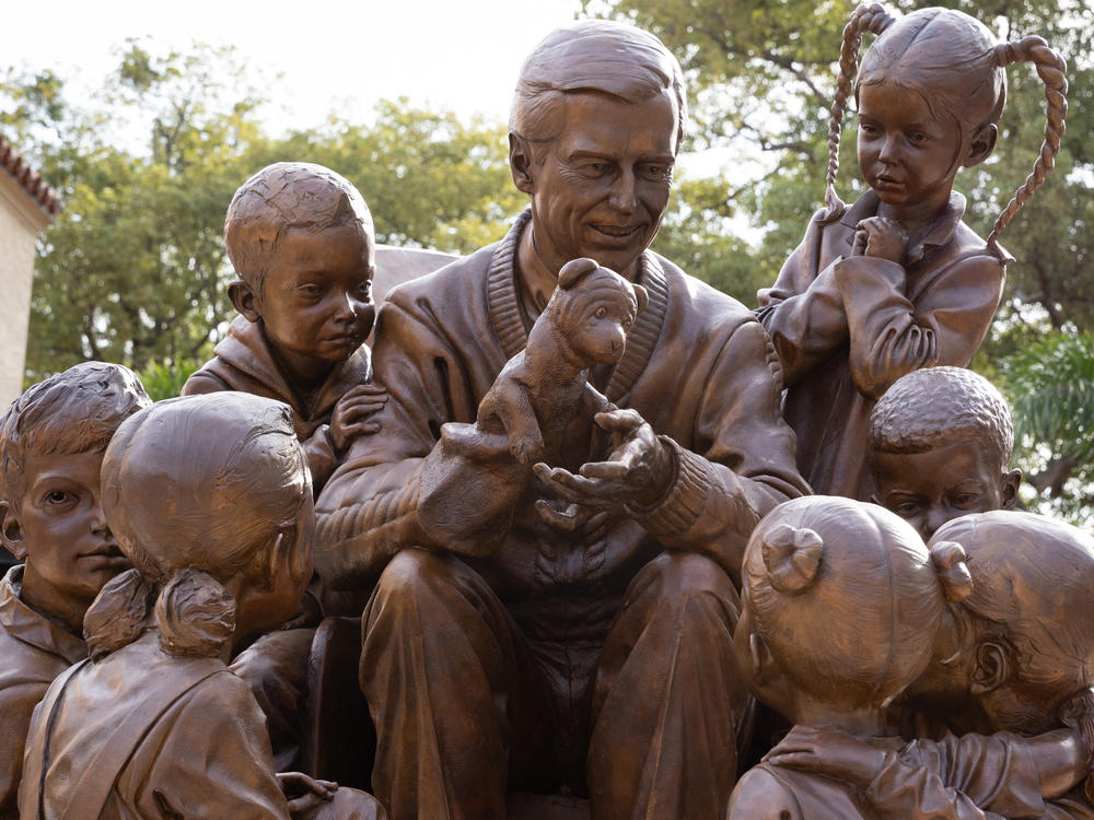 Fred Rogers is memorialized in his role as Mister Rogers in a new statue unveiled by Rollins College in Florida.