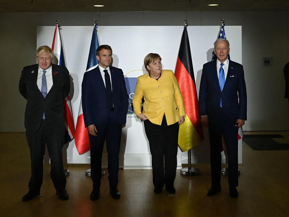 British Prime Minister Boris Johnson (from left), French President Emmanuel Macron, German outgoing Chancellor Angela Merkel and President Biden meet in Rome to discuss renewed talks over the Iran nuclear deal.