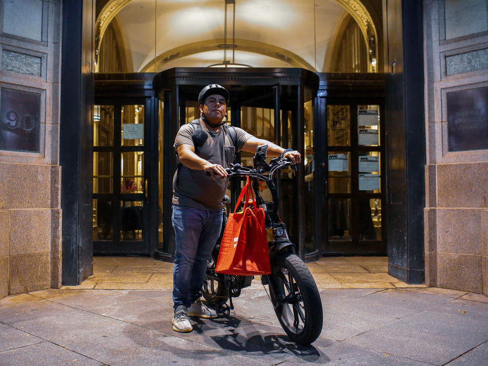 Gustavo Ajche delivers food for DoorDash in Lower Manhattan. Ajche, who has helped organized 3,000 other food delivery workers during the pandemic, was one of the activists who helped get legislation passed to improve working conditions and pay for the couriers, October 15, 2021.