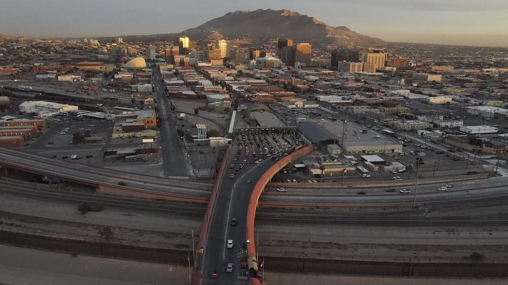 Cars line up at the Paso del Norte international bridge in Ciudad Juarez, Mexico, below, on the border with El Paso, Texas on Monday.