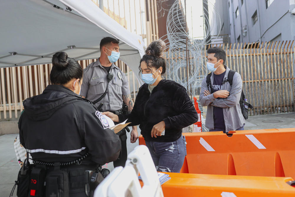 U.S. Customs agents check vaccination cards at the San Ysidro Port of Entry.