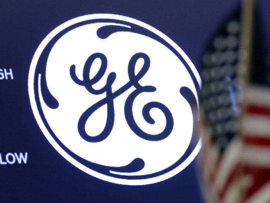 The General Electric logo appears above a trading post on the floor of the New York Stock Exchange in 2018.