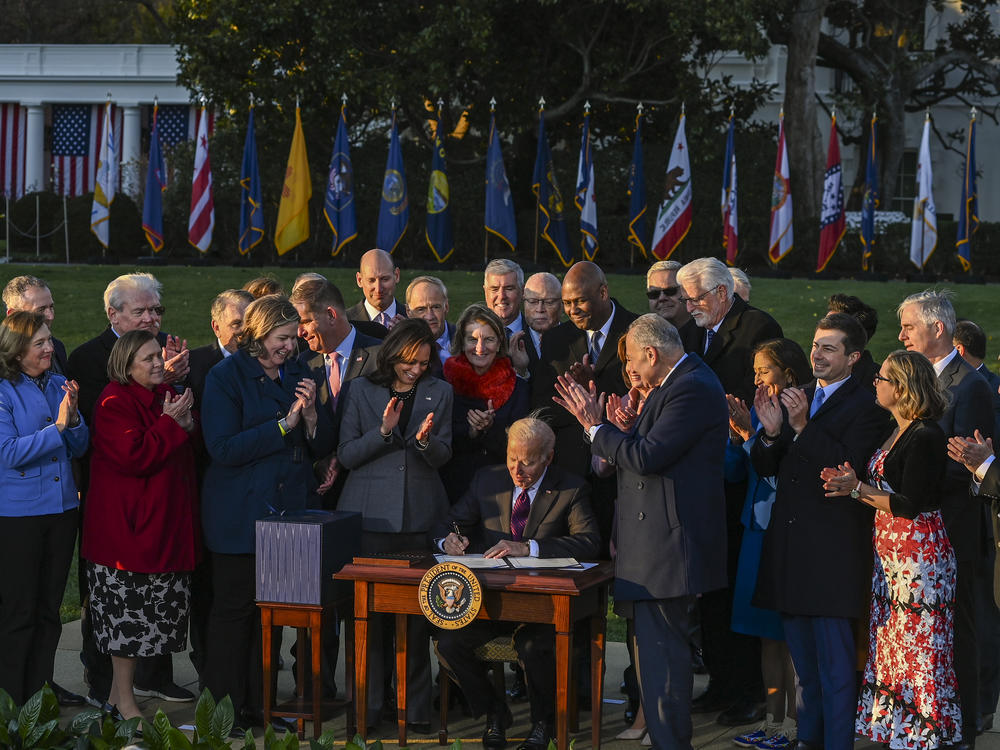 Biden Signs The $1 Trillion Bipartisan Infrastructure Bill Into Law ...