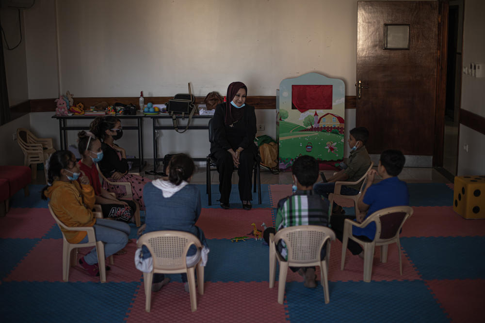 Psychologist Aida Kassab leads children through a psychodrama session aimed at helping them cope with the trauma of the Gaza-Israel conflicts.