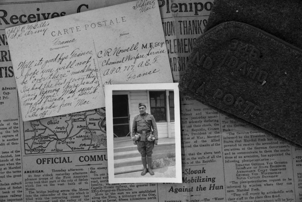 Various contents in the trunk such as a newspaper, a handwritten letter and a U.S. army cap illustrate his experiences in France while he was serving in WWI. The photograph of John B. McGillis was reportedly taken after the war, in an unknown location. While in uniform, he shows off his artifacts collected from war.