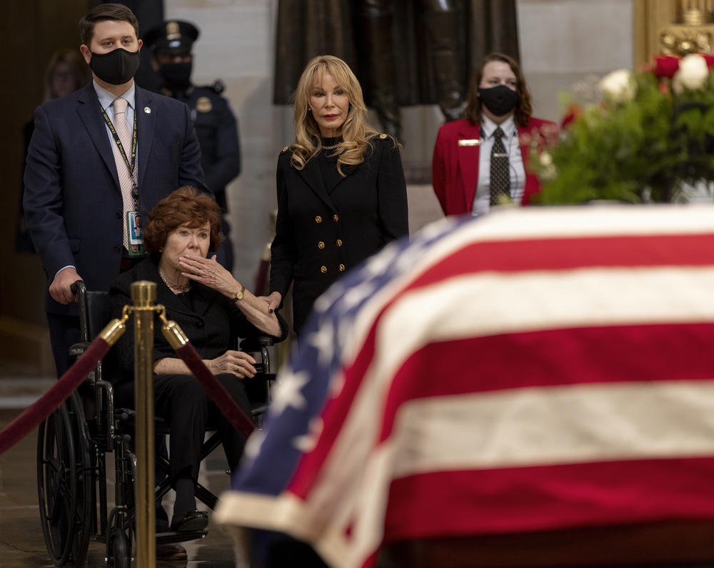 Betty Meyer, former secretary for Sen. Dole, pays her respects. The casket will remain at the Capitol until Friday's departure to the funeral service at National Cathedral.