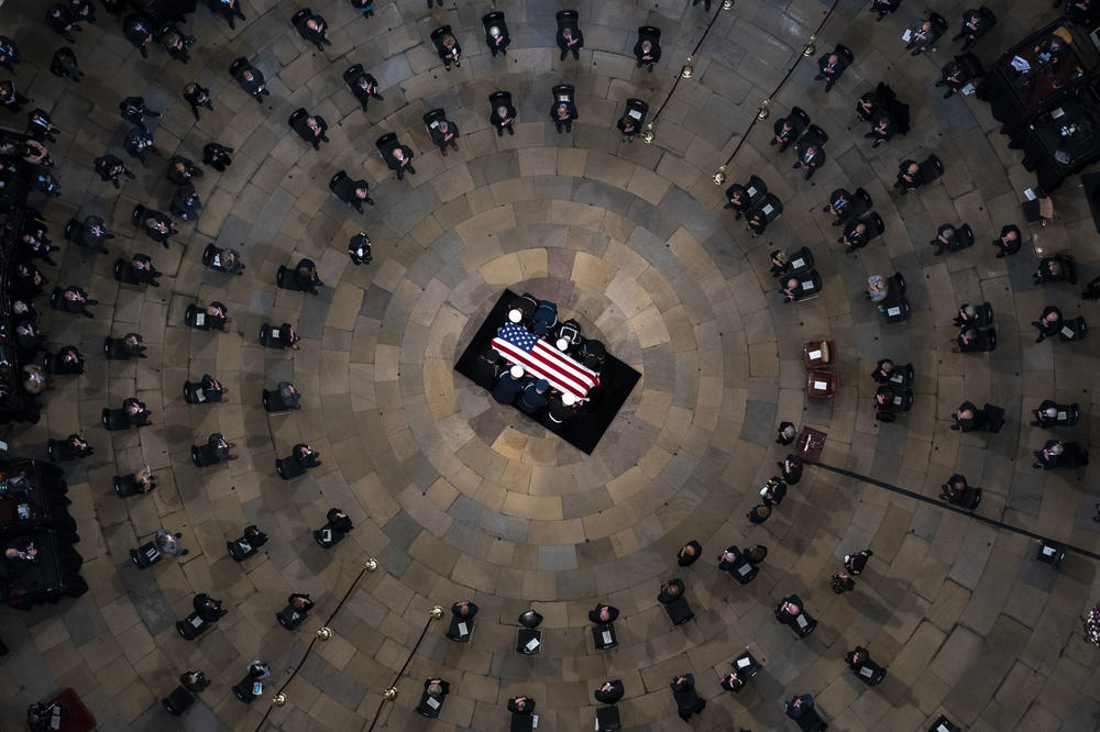 The casket of former Sen. Bob Dole arrives in the Rotunda of the U.S. Capitol, where he will lie in state, on Dec. 9, 2021 in Washington, D.C.