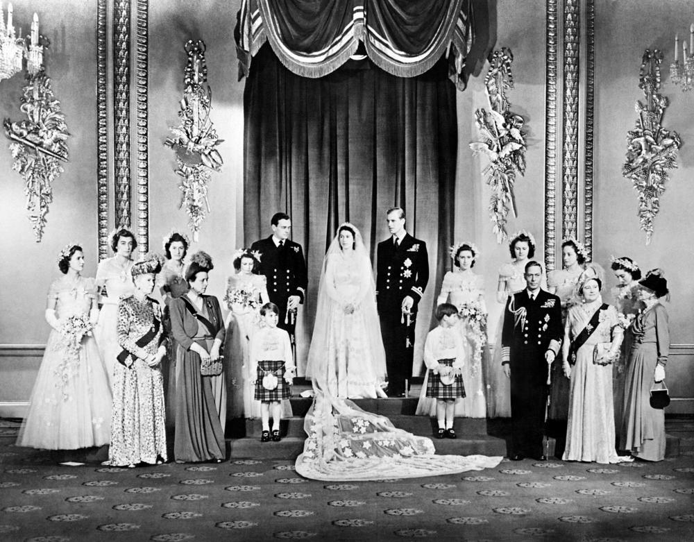 <strong>November 20, 1947:</strong> Members of the British royal family and guests pose around Princess Elizabeth and Philip, Duke of Edinburgh, on their wedding day in the Throne Room at Buckingham Palace, London, England.