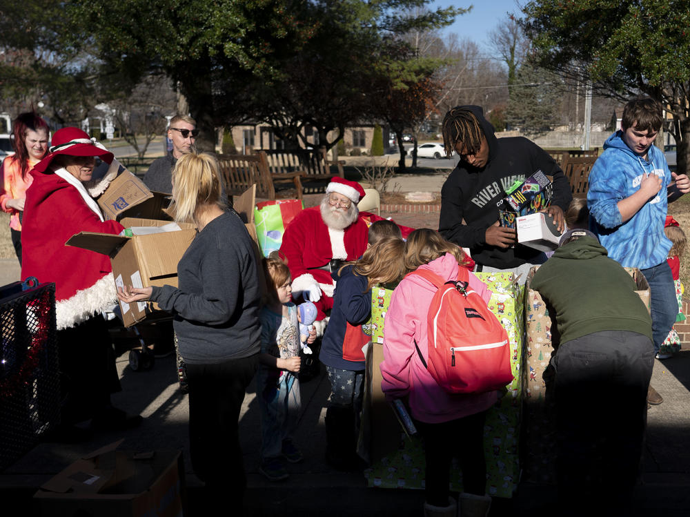 Volunteers and community members attend the WPKY toy drive in Princeton, Ky.