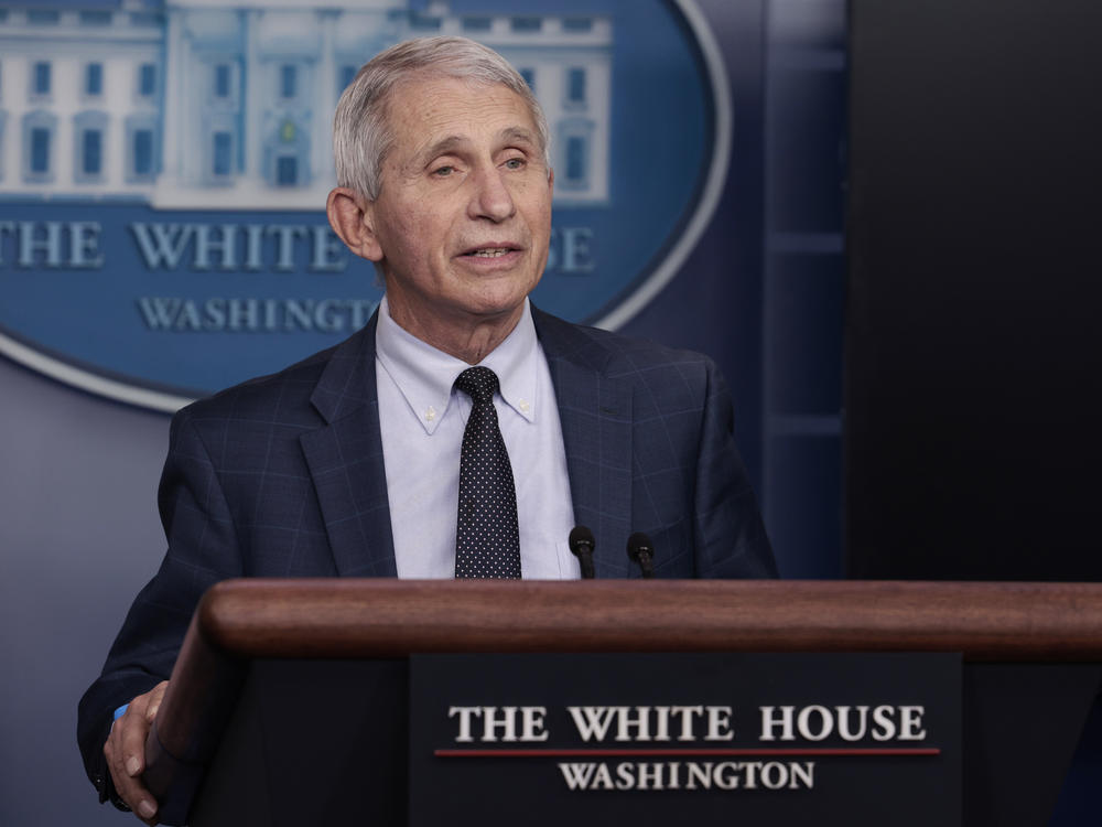 Dr. Anthony Fauci, chief medical adviser to President Biden, says easing quarantine rules for health care workers will help keep them in their essential jobs.