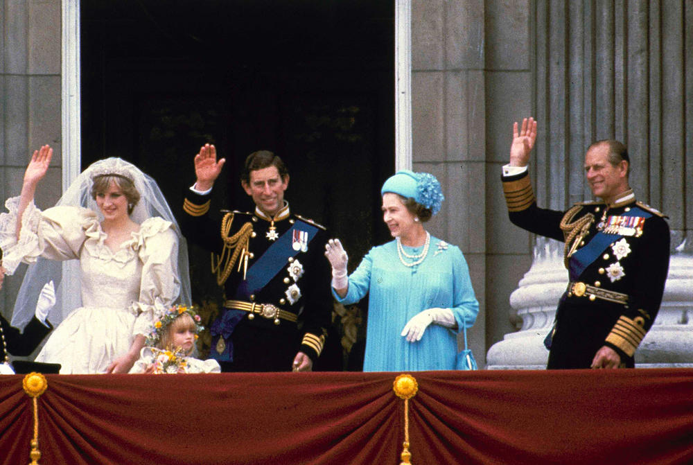 <strong>July 29, 1981:</strong> Prince Charles and his bride Diana, Princess of Wales, wave from the balcony of Buckingham Palace after their marriage at St. Paul's Cathedral in London, England.