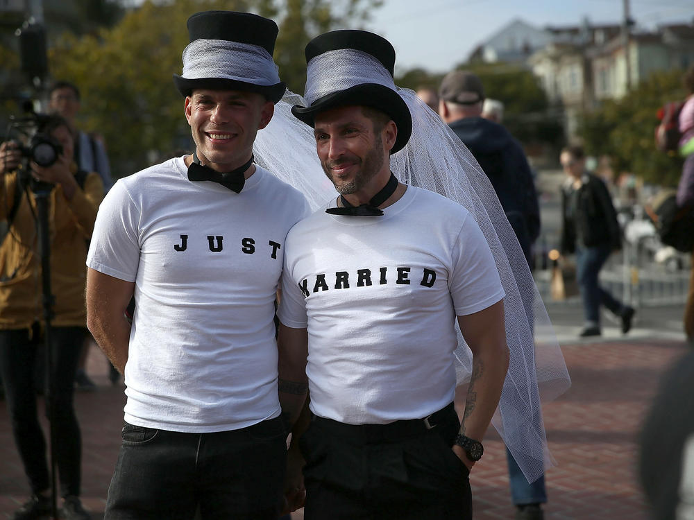 Same-sex marriage supporters wear 