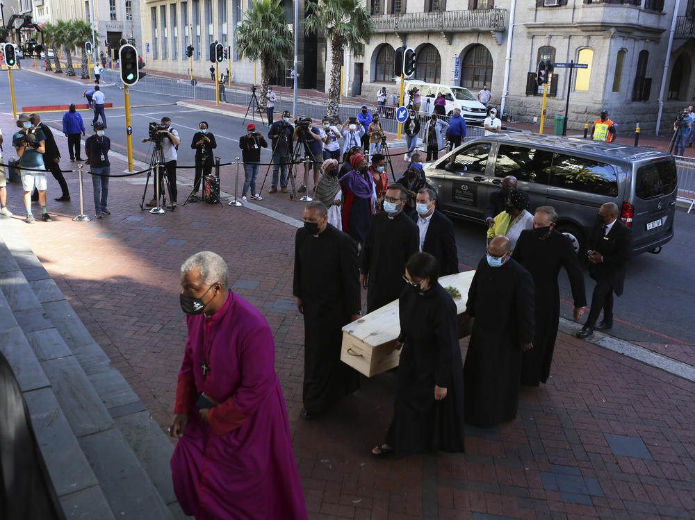 The coffin carrying the body of Anglican Archbishop Emeritus Desmond Tutu arrives on Friday at the St. George's Cathedral, where he will lie in state for a second day in Cape Town, South Africa.