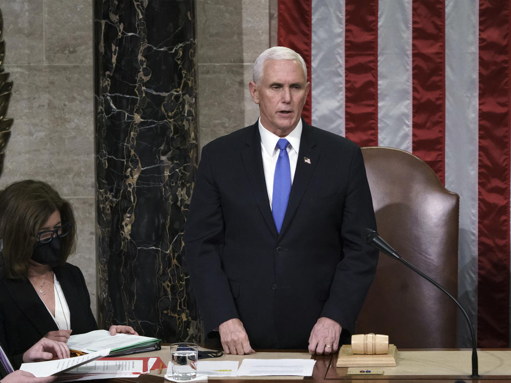 Hours after rioters stormed the Capitol on Jan. 6, 2021, Vice President Mike Pence listens after reading the final certification of the Electoral College votes cast in the 2020 presidential election.