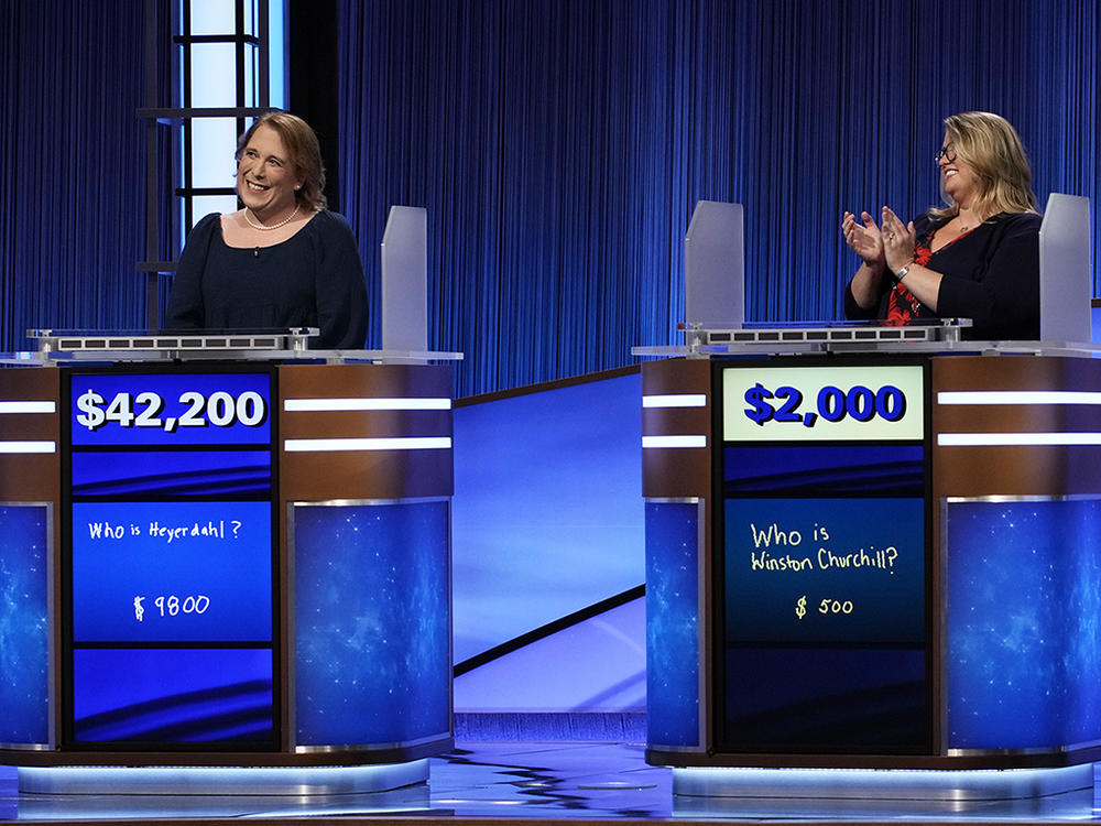 With her win Friday, Amy Schneider (left) became the first woman in <em>Jeopardy!</em> history to win more than $1 million.
