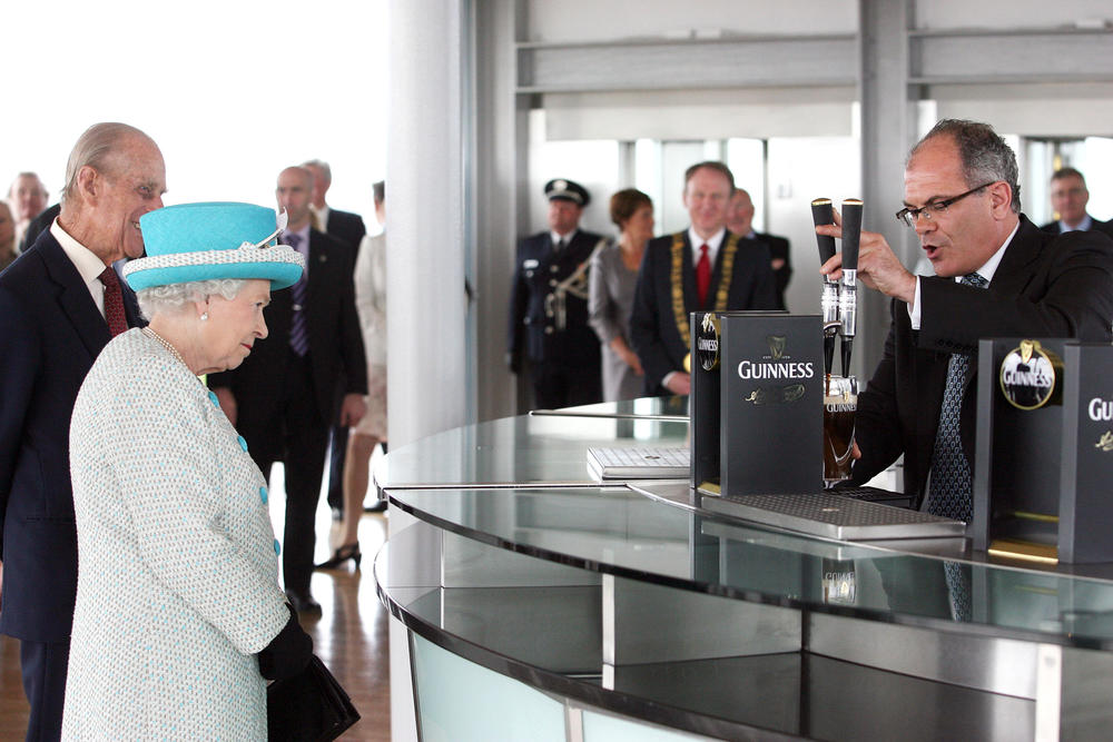 <strong>May 18, 2011:</strong> Queen Elizabeth II and Prince Philip, Duke of Edinburgh, visit the Guinness Storehouse and watch the pouring of a pint in Dublin, Ireland. The Duke and Queen's visit to Ireland was the first by a monarch since 1911.