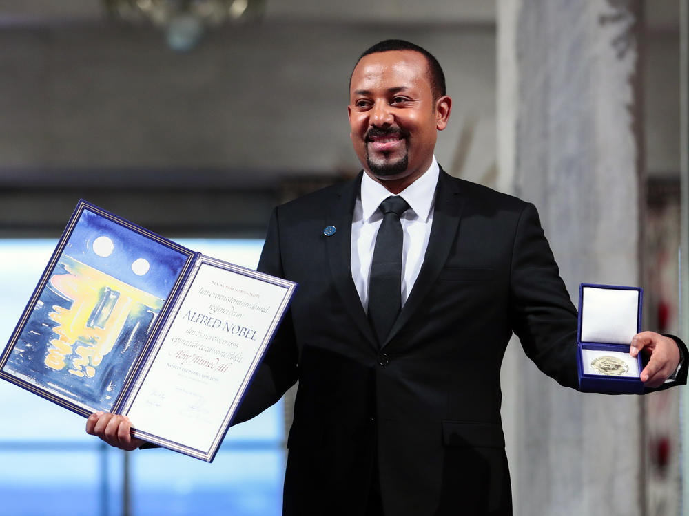Ethiopia's Prime Minister Abiy Ahmed poses for the media after receiving the Nobel Peace Prize in Oslo, Norway, on Dec. 10, 2019. The Norwegian Nobel Committee on Thursday  issued a very rare admonition to Abiy over the war and humanitarian crisis in his country's Tigray region.