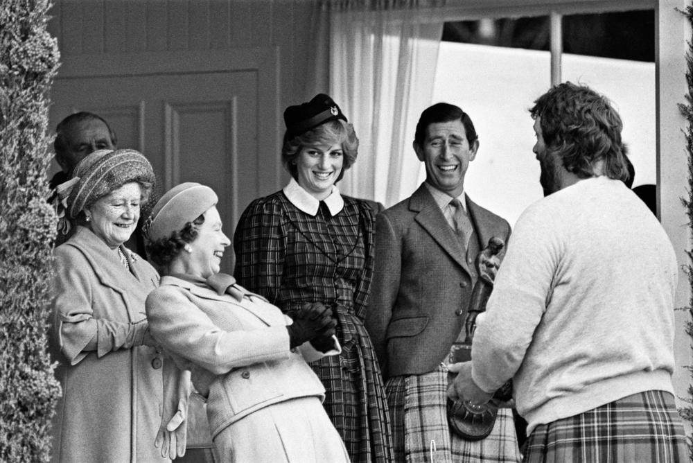 <strong>September 4, 1982:</strong> The Royal family share a joke with Geoff Capes as they attend the Braemar Highland Games in Scotland. From left: The Queen Mother, Queen Elizabeth II, Princess Diana, Prince Charles and Geoff Capes.