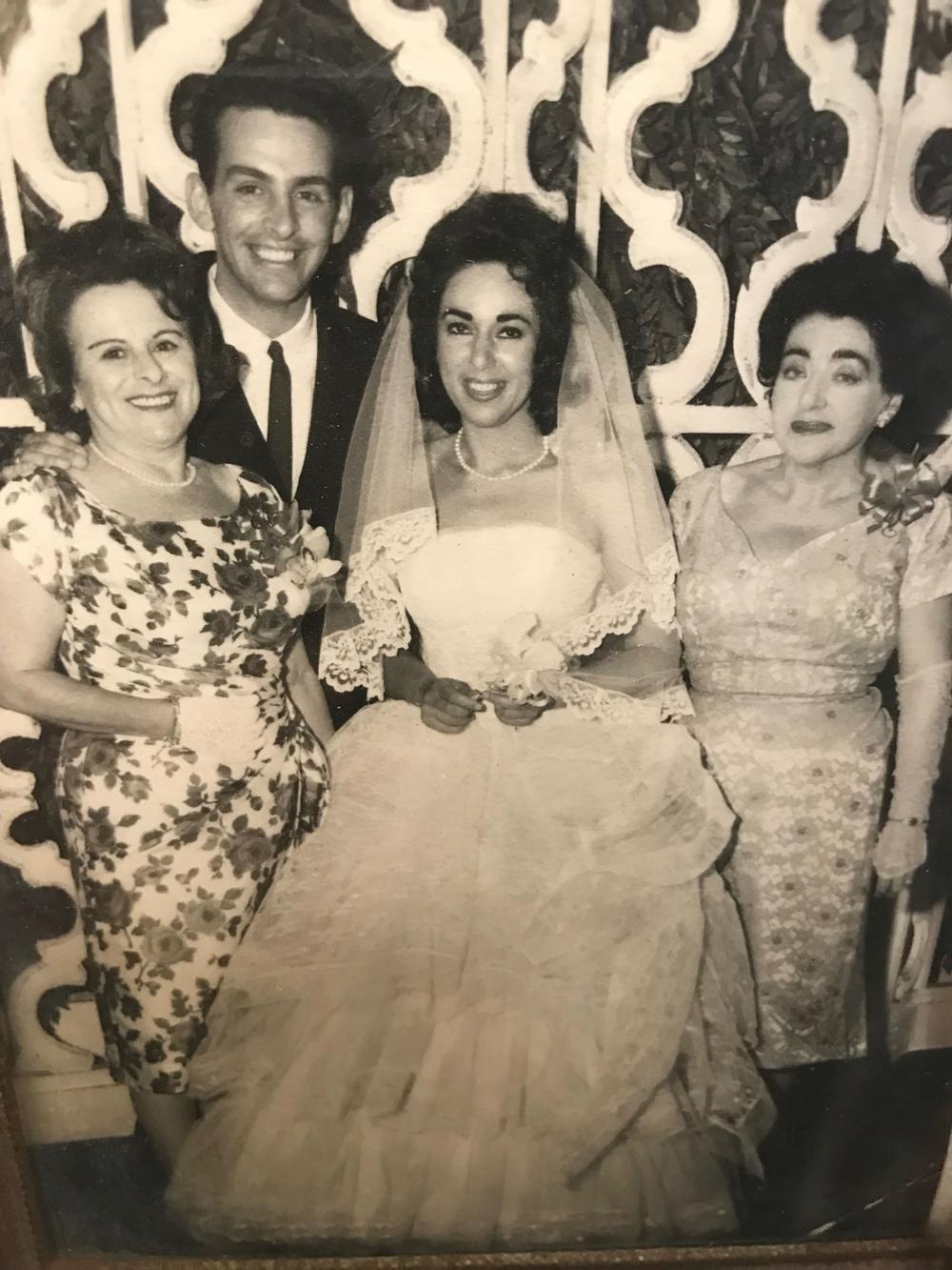 Marty and Elayne on their wedding day accompanied by their moms, Ada Rauch (left) and Rachelle Rosen (right).
