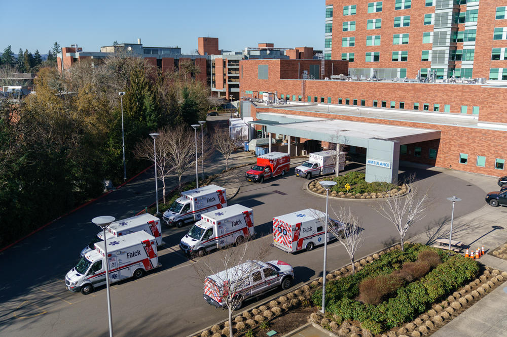 Emergency transport vehicles stack up outside the emergency department at Salem Health on Jan. 27.