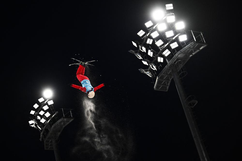 A forerunner takes part in a freestyle skiing aerials training session during the Beijing 2022 Winter Olympic Games at the Genting Snow Park in Zhangjiakou on February 8, 2022.