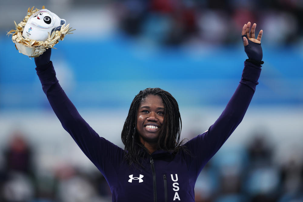 Erin Jackson celebrates her victory. She is the first Black woman to win a medal in speed skating at the Olympics.