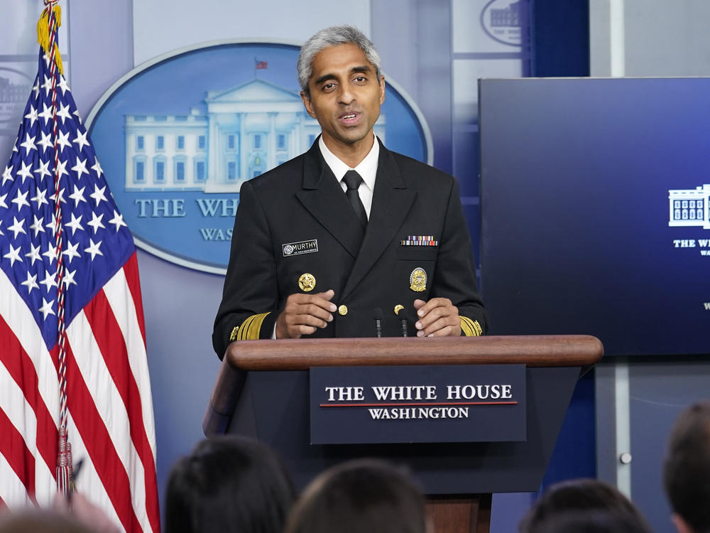 U.S. Surgeon General Dr. Vivek Murthy speaks during the daily briefing at the White House in Washington. Murthy says that he and the rest of his immediate family have tested positive for COVID-19.