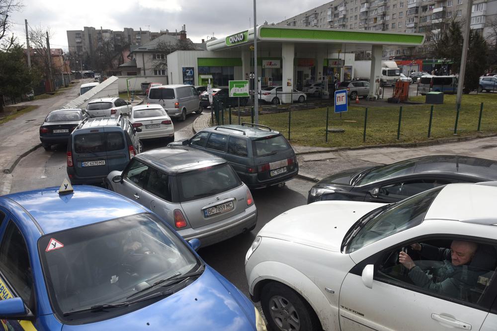 People queue at a petrol station in the western Ukrainian city of Lviv on Feb. 24.