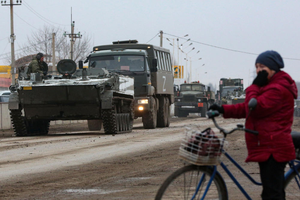 Russian army military vehicles are seen in Armyansk, Crimea, on February 25, 2022. - Ukrainian forces fought off Russian invaders in the streets of the capital Kyiv on February 25, 2022.