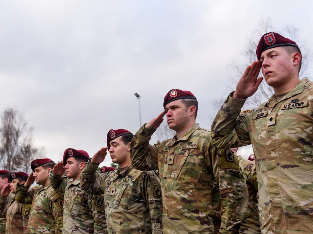 Soldiers of an airborne brigade of the U.S. Army stand at the Adazi Military Base of the Latvian armed forces in upon arrival Friday for their mission to strengthen the NATO presence in the region.