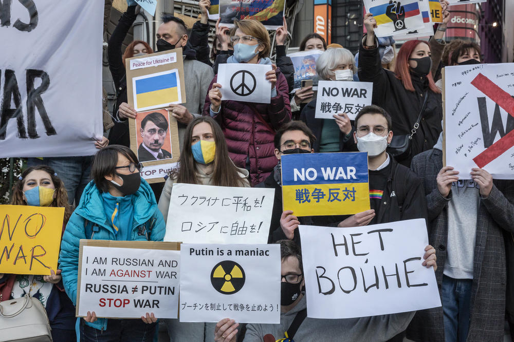 People protest against Russia's attack on Ukraine in front of Shinjuku station on Saturday in Tokyo, Japan. Japanese Prime Minister Fumio Kishida condemned Russia's attack on Ukraine and stated that it undermines the foundation of the international order.