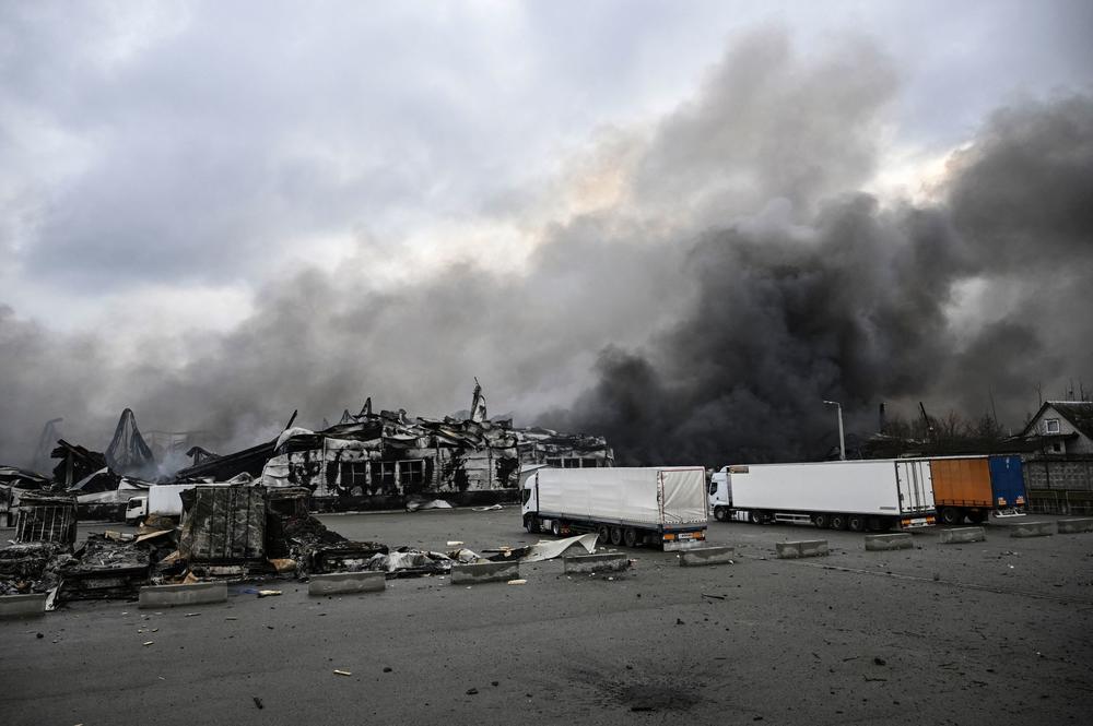 <strong>March 4:</strong> Smoke rises from a bombed warehouse in the town of Stoyanka, west of Kyiv.