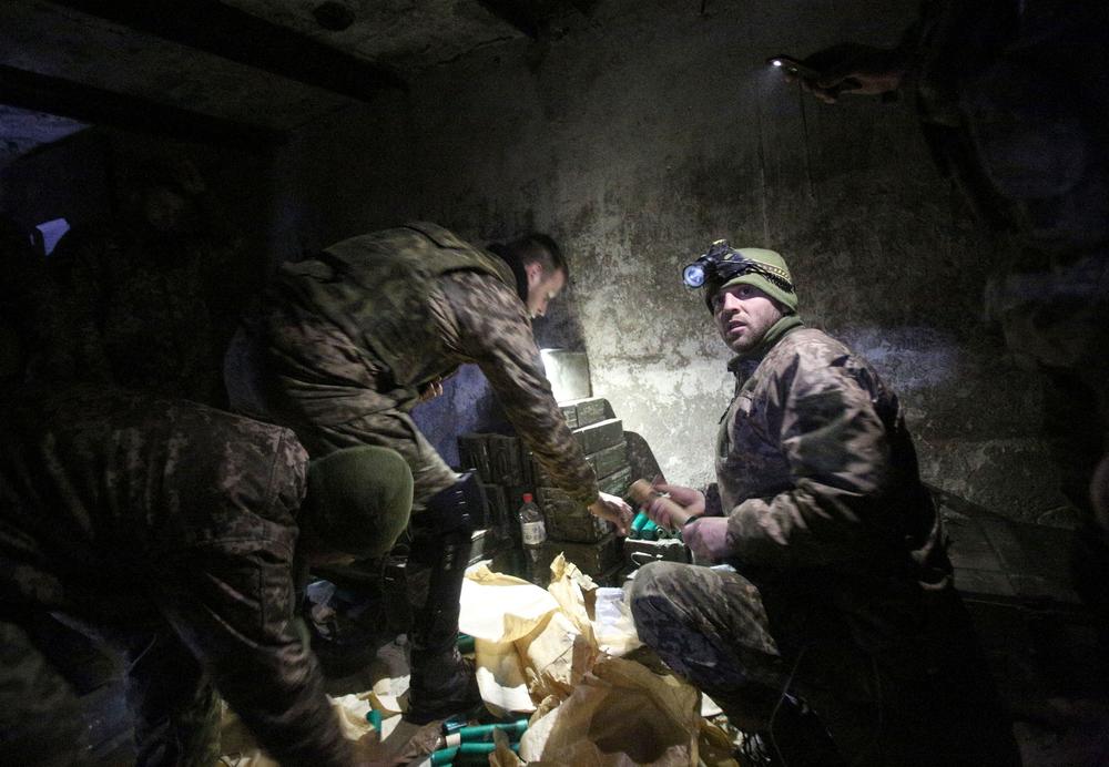 <strong>March 5:</strong> Servicemen of the Ukrainian Military Forces prepare their equipment to repel a tank attack on a position in the Lugansk region.