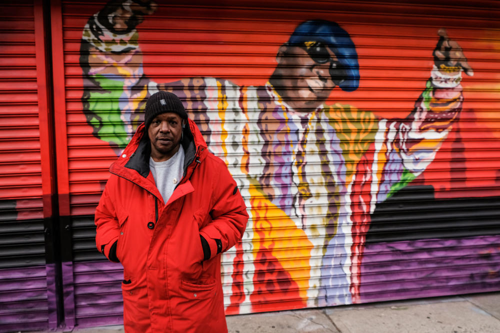 Preme is a rapper and DJ who early on, fought in rap battles with B.I.G. He stands on Fulton Street & St. James Place, the area where Biggie grew up.