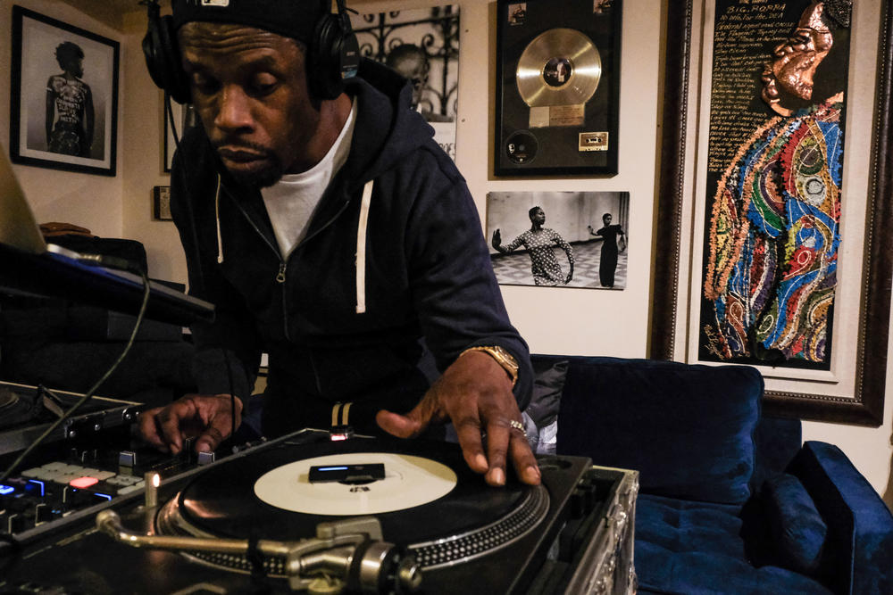 Richard Grant, aka DJ Twin, spins some of Notorious BIG's greatest hits in his home in Bed Stuy. DJ Twin did shows with Notorious BIG when he was touring and producing records for rapper Redman.