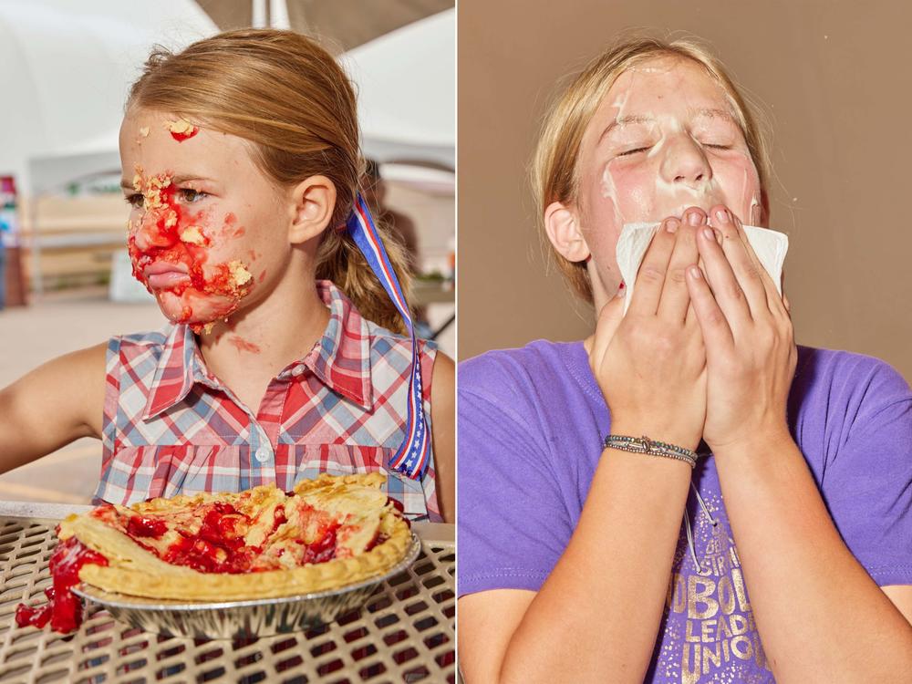 Two participants recover after the Moffat County Fair's pie-eating contest in Craig, Colo., on Aug. 7, 2021.