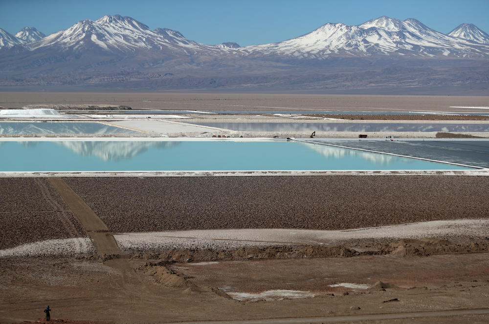 Brine pools from a lithium mine owned by U.S.-based Albemarle Corporation are seen in the Atacama desert, Chile, on Aug. 16, 2018. Mines like these are the start of a global supply chain for battery materials that has become critically important as electric vehicles rise in popularity.