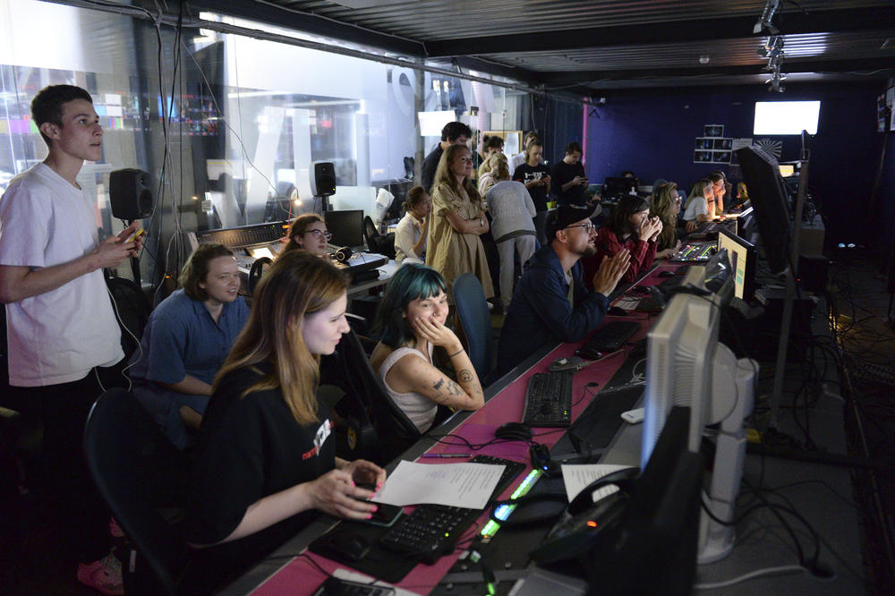 Journalists work in the newsroom of the Dozhd TV channel in Moscow last August. The independent channel recently suspended its operations amid government pressure. The station went off air with a vintage Soviet broadcast of <em>Swan Lake</em> — the classic Tchaikovsky ballet that Russians have come to view as a broadcast harbinger of repression and political turmoil.