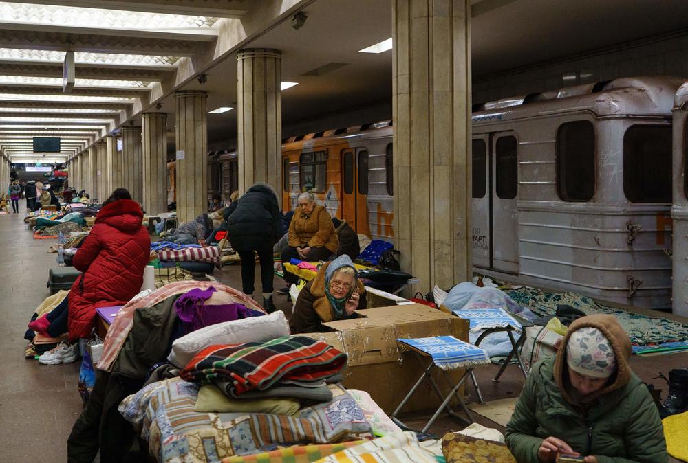 People rest as they take shelter from attacks in a metro station in Kharkiv, Ukraine, on March 10.