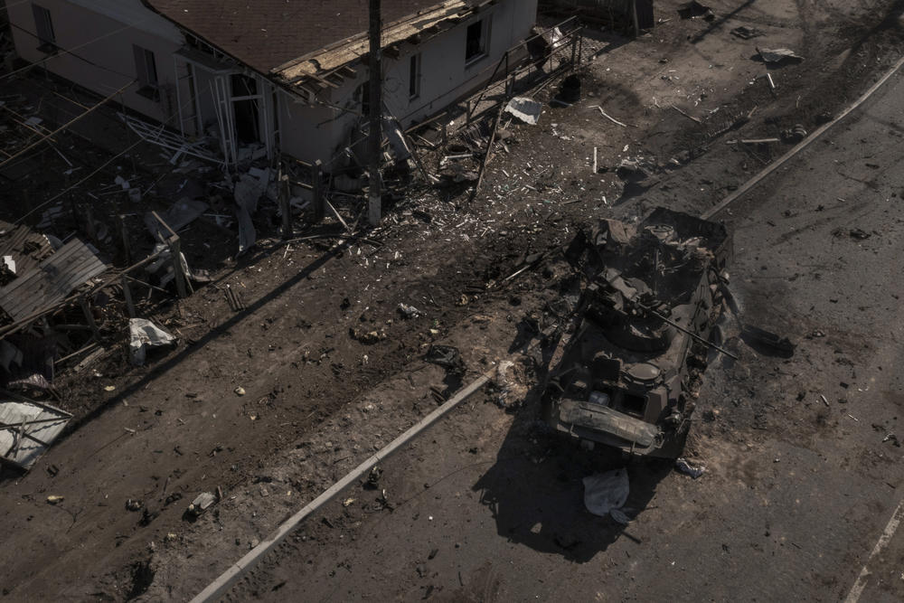 A destroyed Russian vehicle is seen after battles on a main road north of Kyiv, Ukraine. The image of a single vehicle is powerful, but it doesn't tell the whole story.